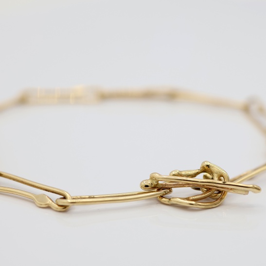 sol_gouden_armband_open_schakels_met_klein_smeltstukje